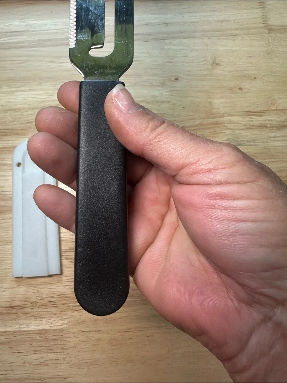 The Pampered Chef Cheese Plane with Black Handle and White Sheath #1125